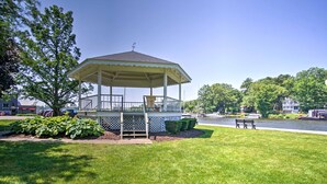 A gazebo with a railing, a bench, and a small deck area. - Historic Loft w/ Private Deck, 2 Blocks to Dtwn (Saugatuck)