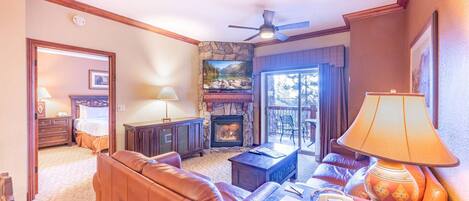 Televisión, chimenea, estéreo