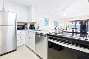 Fridge, microwave, oven, stovetop - Sun-Soaked Ground Floor Corner Condo – W/ BBQ Grills, Heated Pool & Steps to the Pier! ☀️ (Cocoa Beach)