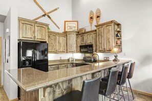 Microwave, stovetop, dishwasher, coffee/tea maker