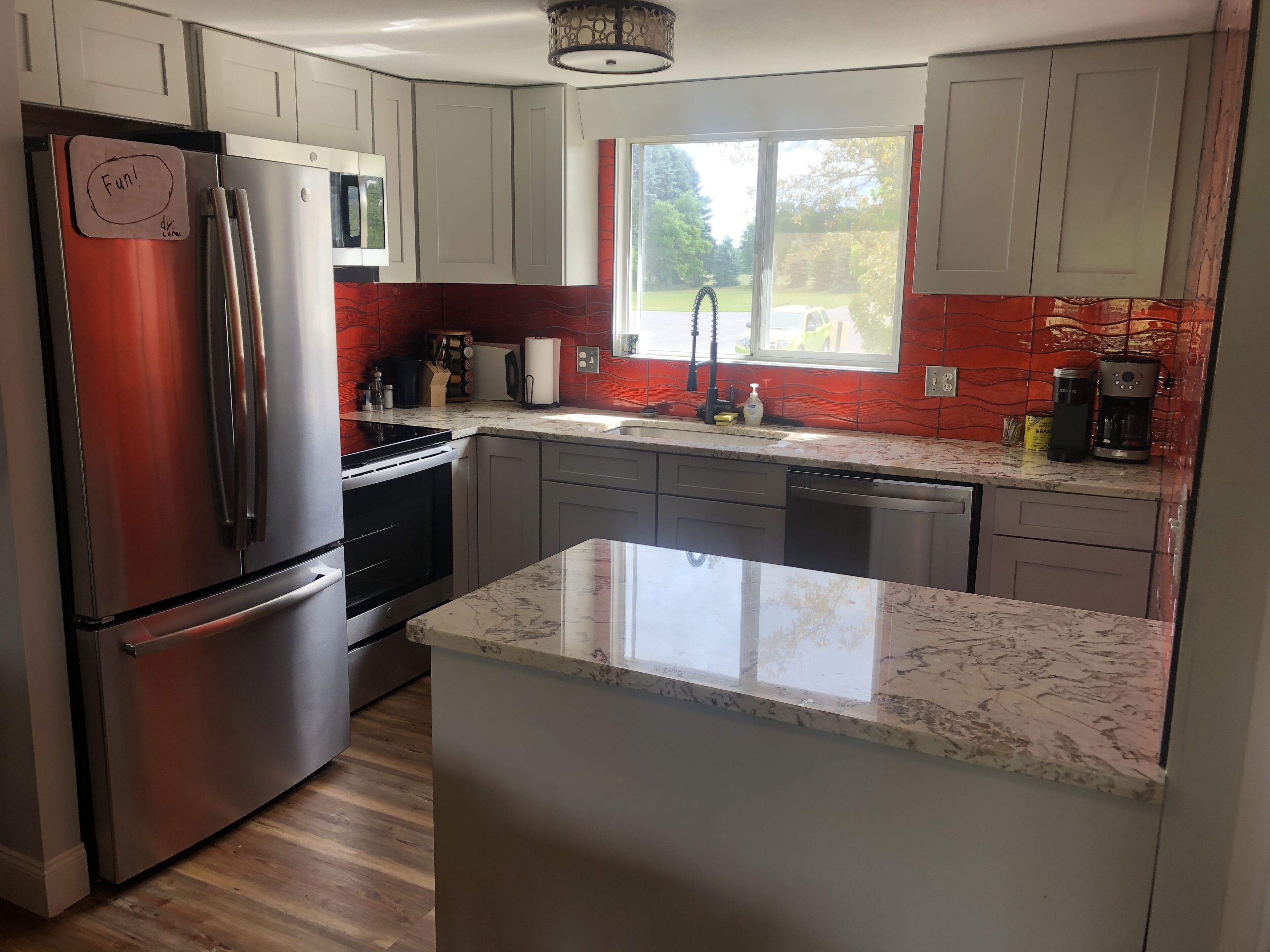 Coffee/tea maker, fridge, microwave, oven