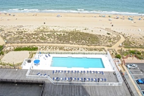 Pool - Comfortable 2 bedroom oceanfront condo popping with color that has free WiFi, and a balcony with an amazing ocean view located uptown just steps to the beach! (Ocean City)