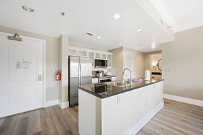 Microwave, stovetop, dishwasher, coffee/tea maker