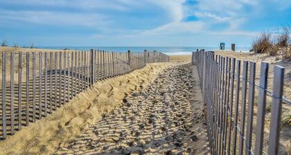Stylish, upscale 3 bedroom condo with a television in every bedroom and living room, free WiFi, and two floors located downtown only a few streets from the boardwalk and only steps to the beach!