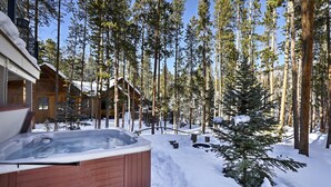 A wooden cabin with a hot tub in a snowy forest. - Hot Tub! Family Gem on Snake River in Keystone! (Keystone)