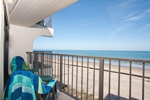 A balcony with a view of the beach and ocean. - Florence II 403 - Rattan resort vibes;Cute bedrooms;Beachfront pool (South Padre Island)
