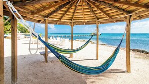 Unclassified image, 2 of 34, button - Blue Serenity: Beach House w/Pool, Pickleball Courts + Backyard Snorkeling (Grand Cayman)