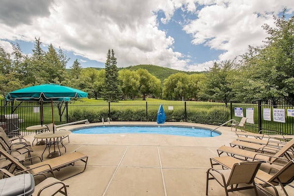 Take in this view from the front door of the home. Stunning views of the pool and Park City Golf Course