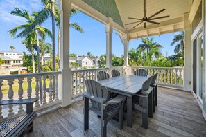 Relax in a serene outdoor space with a deck, table, and comfortable seating.