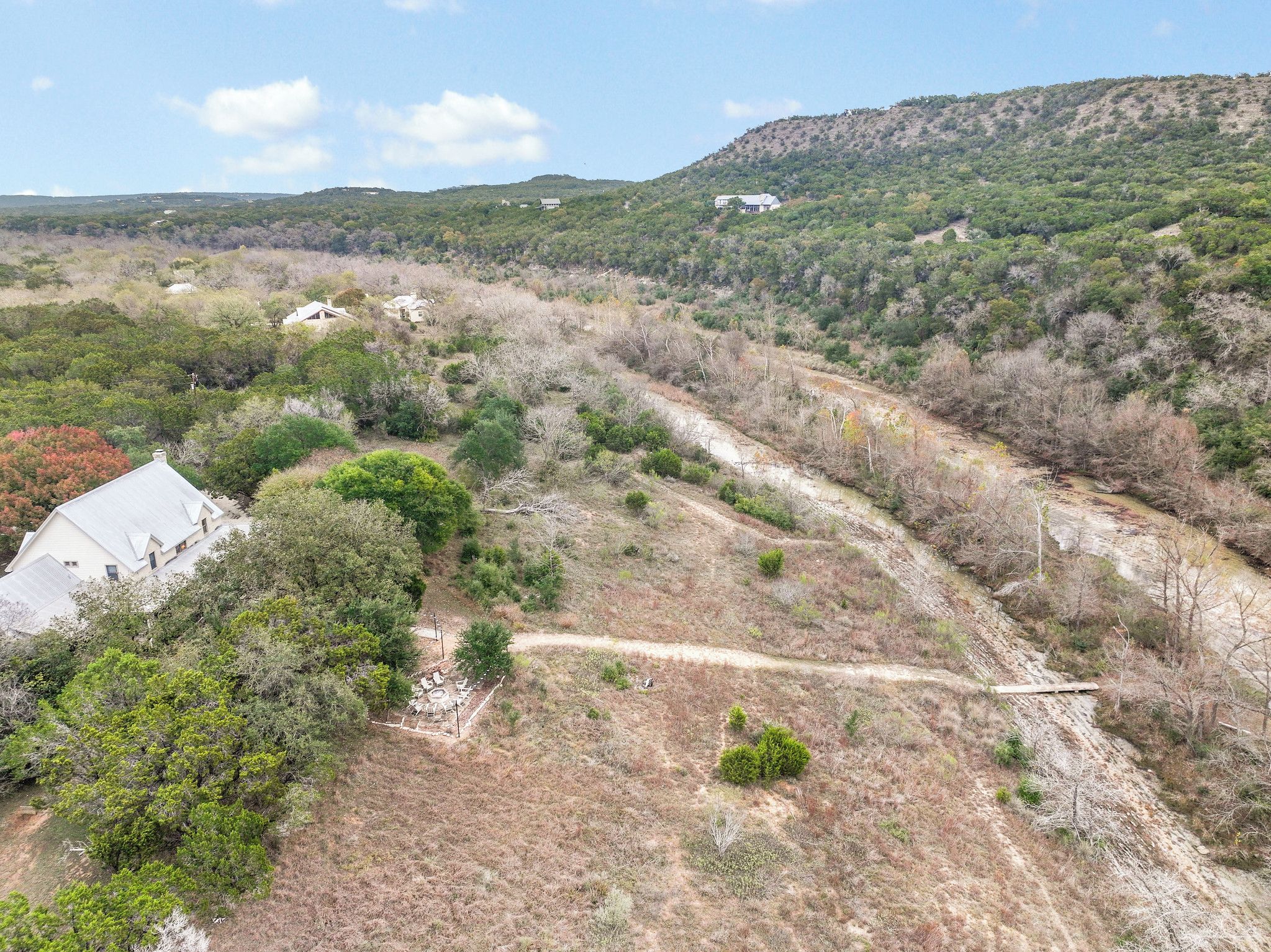 Aerial view showing proximity to river bed