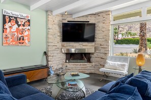 Smart TV, fireplace, DVD player, books