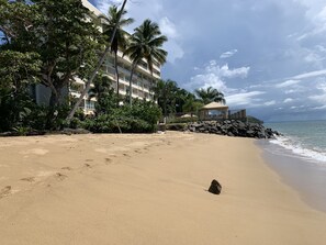 On the beach, sun loungers, beach towels