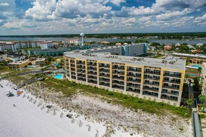 A multi-story hotel with a pool and beach access. - Enjoy this Condo Directly on the Beach! GREAT view! Extended Balcony! (Fort Walton Beach)