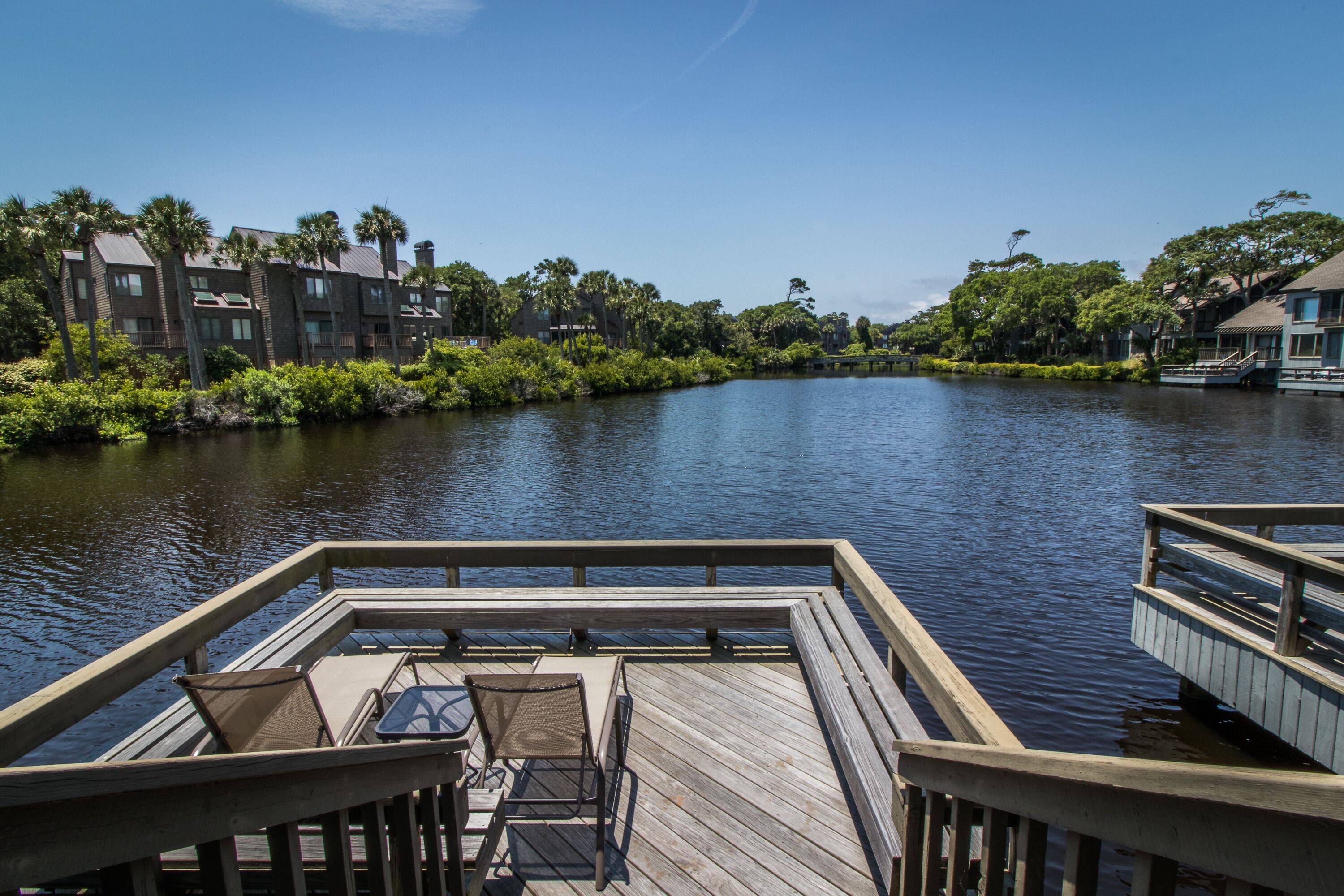 4580 Parkside: 3BR on Lagoon, Dock, Screened Porch, Credit for Bikes/Beach Gear