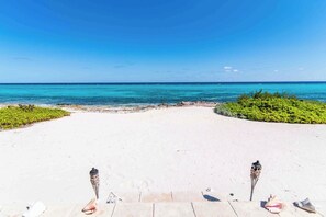 On the beach, sun-loungers, beach towels