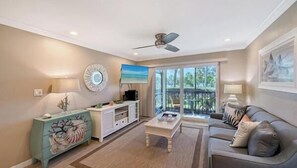 Flat-screen TV, DVD player, ping pong, books