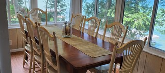 Cozy waterfront cottage on Long Lake. Near TC. Rowboat, grill, A/C.
