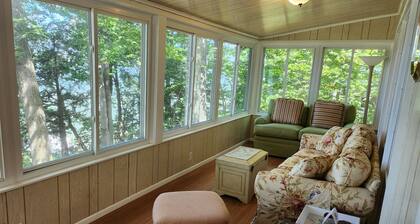 Cozy waterfront cottage on Long Lake. Near TC. Rowboat, grill, A/C.