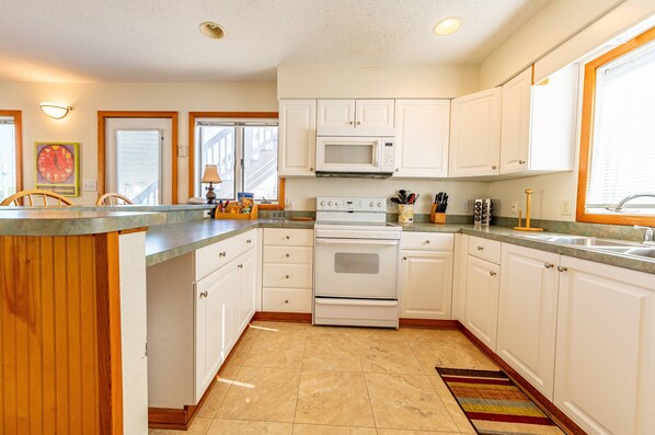 Fridge, microwave, oven, stovetop - Fun 'N Sun - Nags Head MP 16, 250 Ft to Beach Access, Pool, Pets OK, YR Flex Stays (Nags Head)