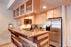 Microwave, stovetop, dishwasher, coffee/tea maker