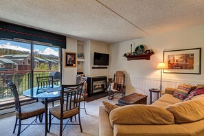 TV, fireplace - Stunning Breckenridge Views, Downtown & Ski-In/Out Condo, Hot Tub! (Breckenridge)