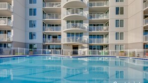 A multi-story hotel with a swimming pool. - Island Princess 609 * Gulf front~Beach Chair Set Included * Salt Water Vacations (Fort Walton Beach)