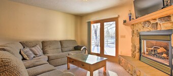 Cozy Riverfront Home w/ Fire Pit in Houghton Lake!