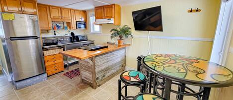 Fridge, microwave, dishwasher, coffee/tea maker