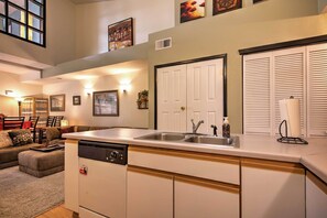 Enjoy cooking in this well-equipped kitchen with a dishwasher and double sink.