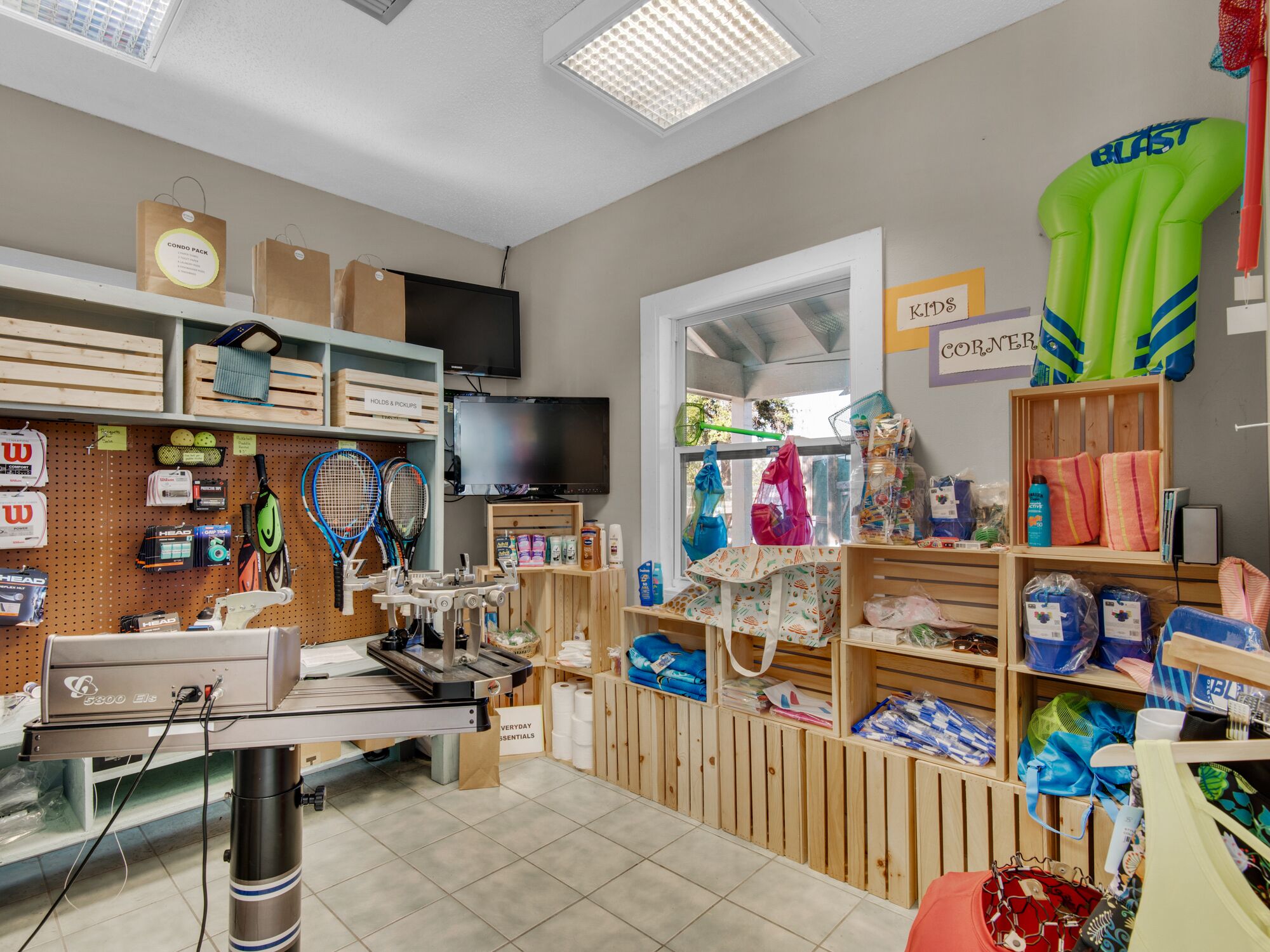 A retail store with a variety of products including sports equipment, household items, and children's toys.