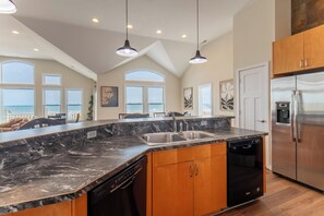 Fridge, microwave, oven, stovetop - JJ's Beach House - Nags Head MP 11, Oceanfront, Pool, Hot Tub, Pool Table, Flex Stays, Pets OK (Nags Head)