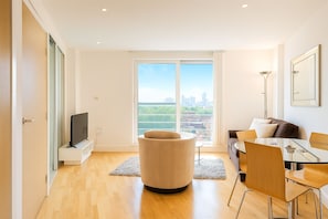 Appartamento, 1 camera da letto (Manhattan) | Area soggiorno | TV a schermo piatto