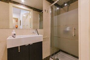Shower, eco-friendly toiletries, hair dryer, towels