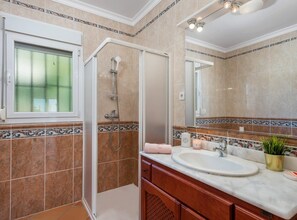Bathtub, hair dryer, towels
