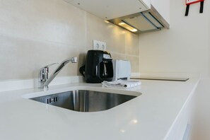 Fridge, microwave, coffee/tea maker, electric kettle