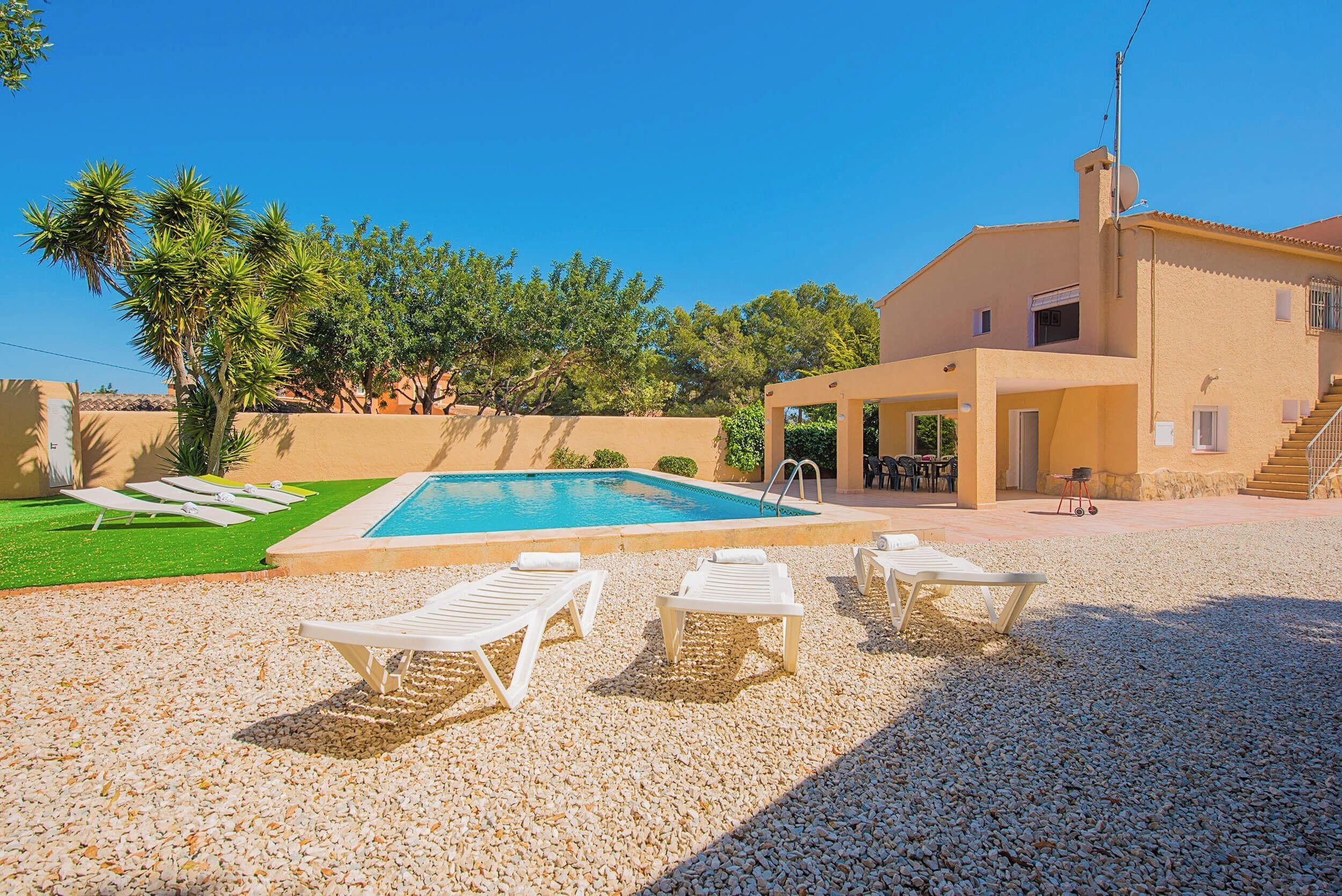 Pleasant summer villa with private pool located in Moraira (Costa Blanca) for 14 people with seven bedrooms and four bathrooms spread over two floors.INTERIOR: You will find on the GROUND FLOOR a living room, a fully equipped kitchen with gas fire and dishwasher. Direct access to a covered terrace and the pool. Three bedrooms, two of them with two single beds and one with a double bed. A bathroom with a bathtub and another with a shower. The FIRST FLOOR is accessed by external stairs. Living room with TV SAT / TDT, four bedrooms, two of them with two single beds and the other two with double bed. A bathroom with bathtub and washing machine and finally a bathroom with shower.EXTERIOR: Large plot where the pool with dimensions 10x5 with metal stairs. Sunbathing space in the hammocks and covered barbecue for outdoor meals. Parking within the plot for 4-5 vehicles.LOCATION: Only 1.2 km away is the center of Moraira, the sandy beach “Ampolla” at 0.9 km, the supermarket “more and more at - 1.2 km. Seaweed pub 0.8 km.OBSERVATIONS: Animals not exceeding 12 kg are allowed with supplement.