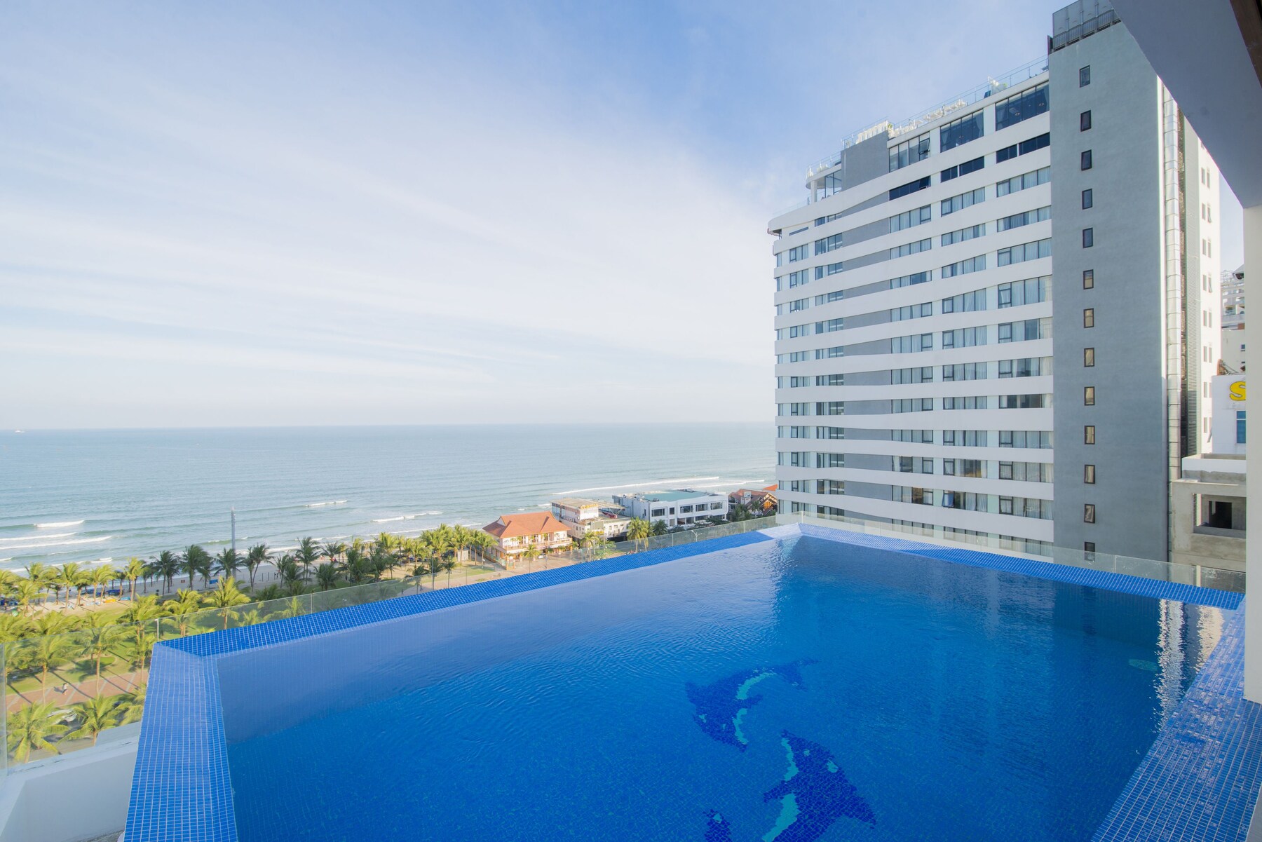 Outdoor pool, open 6 AM to 9 PM, pool umbrellas, pool loungers