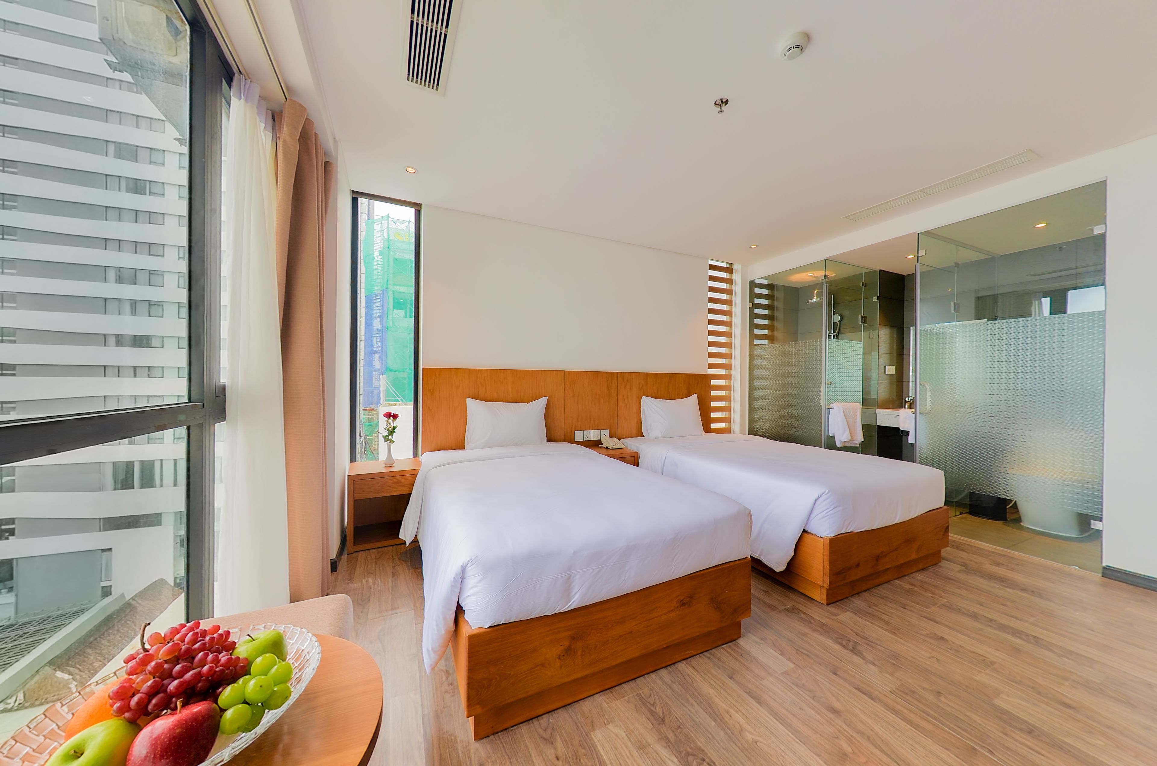 deluxe double or twin room, ocean view | bathroom | rainfall showerhead, free toiletries, hair dryer, slippers