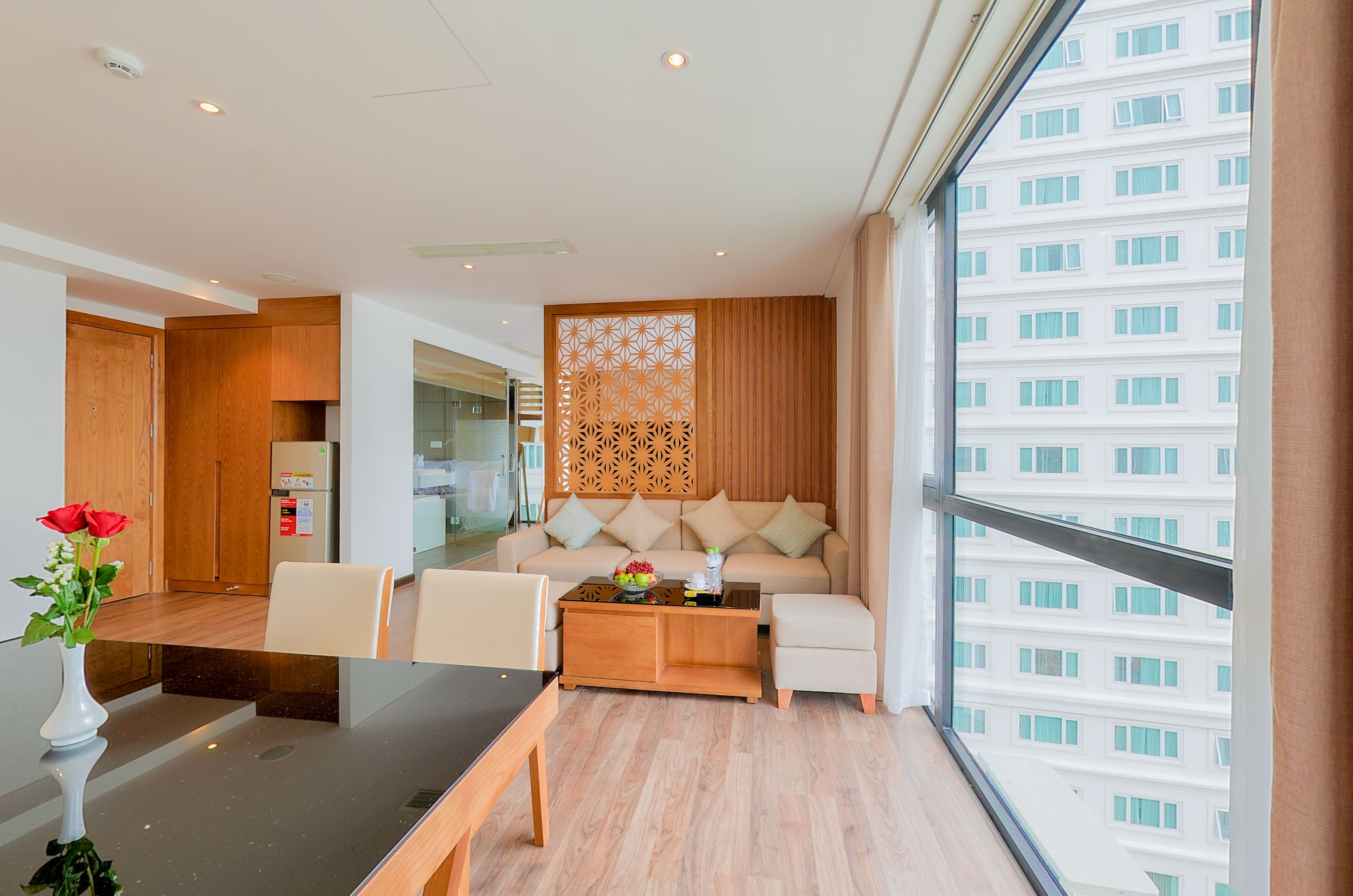 deluxe triple room | living room | flat-screen tv