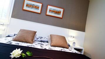 4 slaapkamers, een strijkplank/strijkijzer, gratis wifi, beddengoed