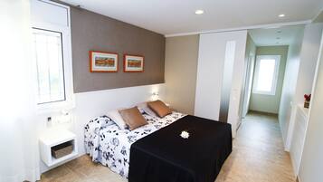 4 dormitorios, tabla de planchar con plancha, wifi gratis y ropa de cama