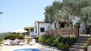 A pool area with lounge chairs, a staircase leading to a building, and a clear sky. - Coster Catalanet, Villa On The Edge Off Pollença With Amazing Views ETV 1808 (Pollença)