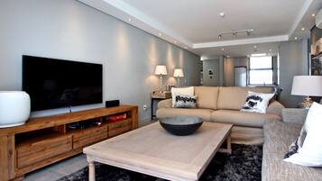 Apartment, 2 Bedrooms | Living room | Flat-screen TV