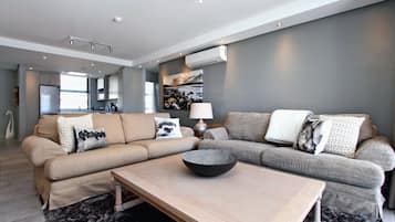 Apartment, 2 Bedrooms | Living room | Flat-screen TV