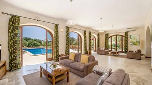 TV, fireplace - The Olives Holiday Home (San Lawrenz)