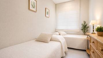 3 dormitorios, tabla de planchar con plancha, wifi gratis y ropa de cama
