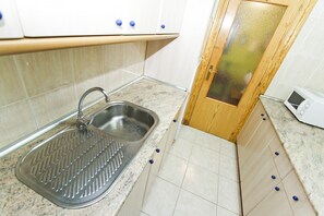 Fridge, microwave, coffee/tea maker, electric kettle