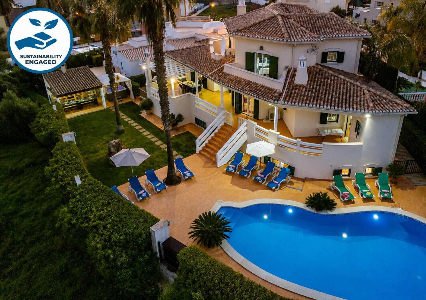 A heated pool, pool loungers