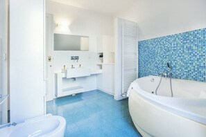 Shower, jetted tub, hair dryer, bidet