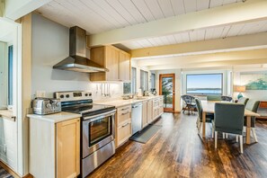 Fridge, microwave, oven, stovetop - Ocean & lake view home with private hot tub & beach access (Cape Meares)